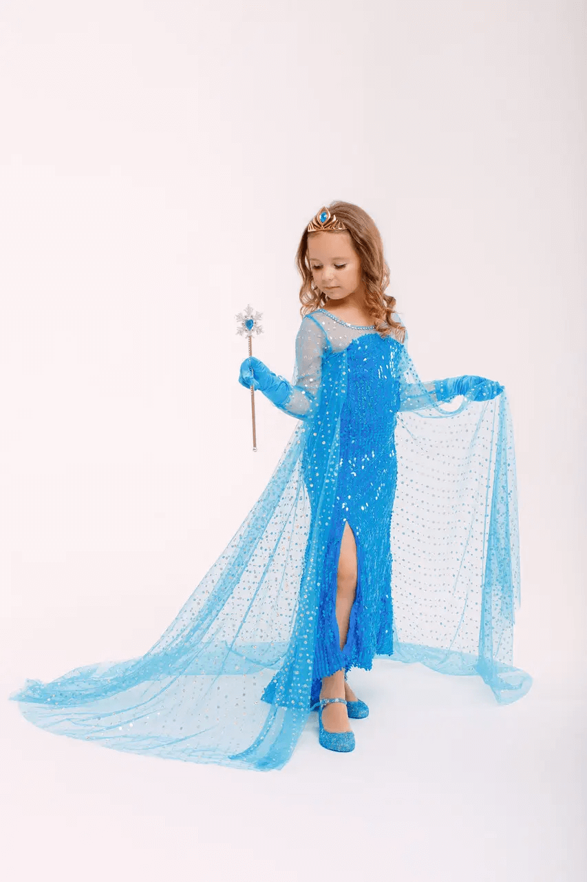 Elsa's sequined blue dress with a train from the “Frozen” animated movie 4