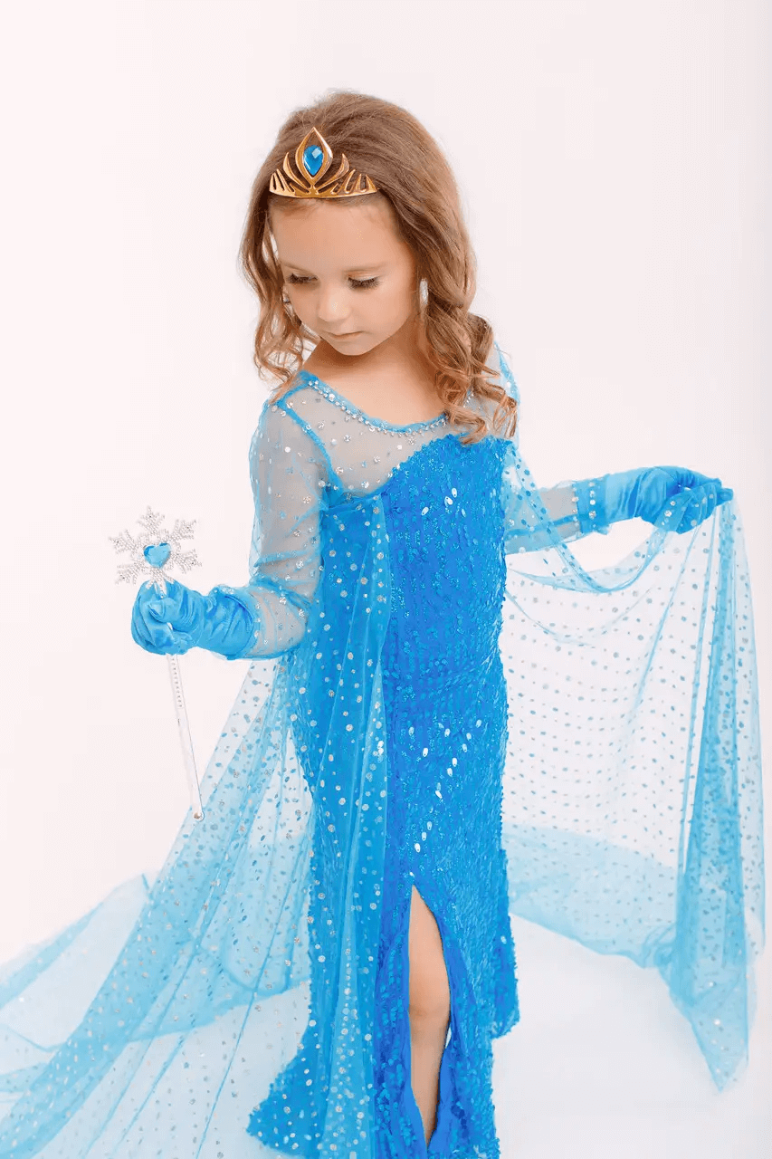 Elsa's sequined blue dress with a train from the “Frozen” animated movie 7